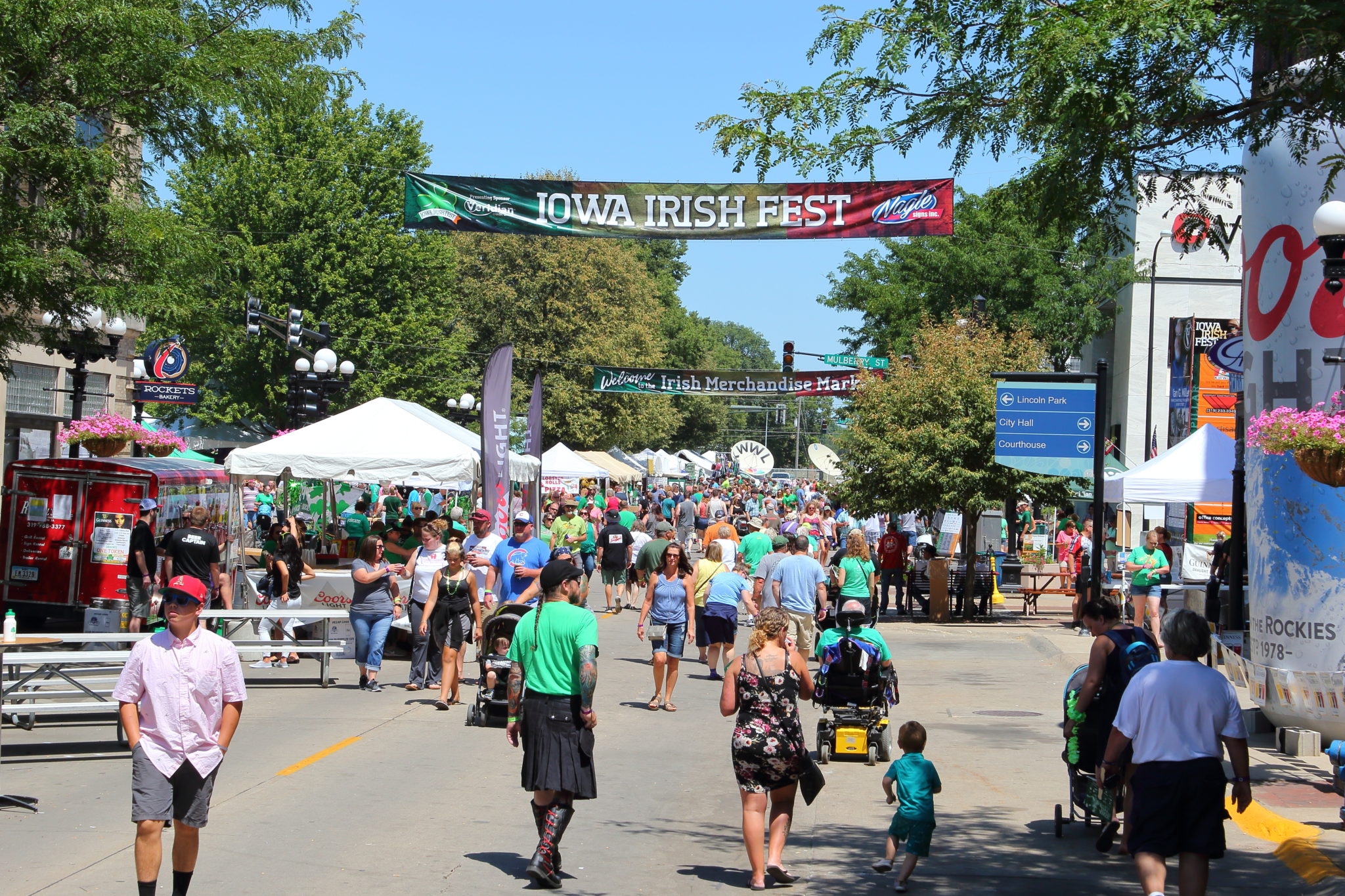 People enjoying Iowa Irish Fest in downtown Waterloo Iowa in the Cedar Valley.